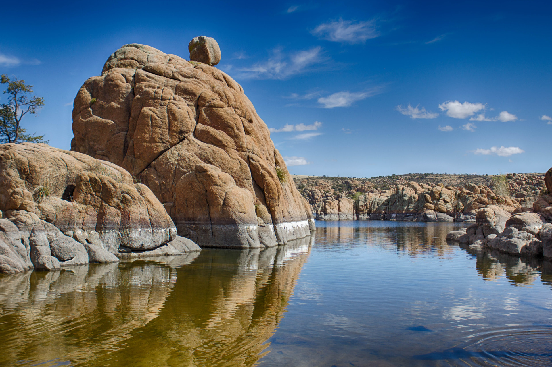 Watson Lake in Prescott, Arizona, with its granite rock formations under a bright sky